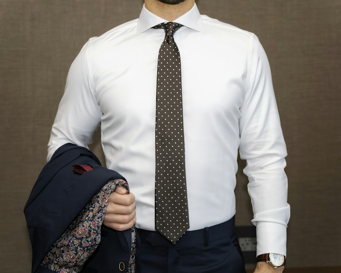 White shirt being reviewed in a content workspace